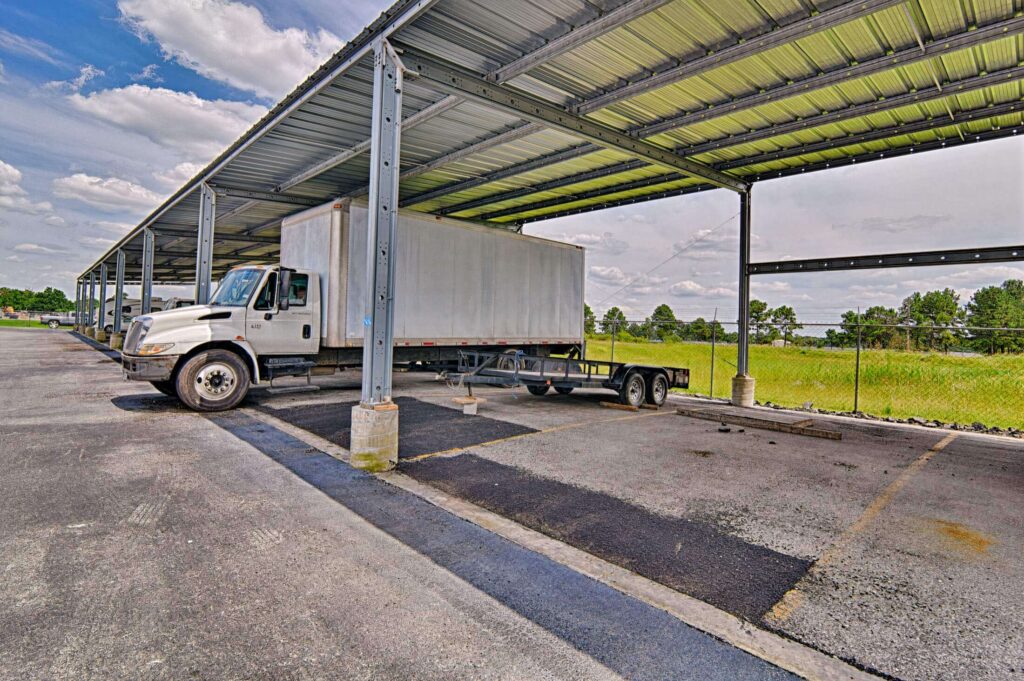 Covered storage vehicle parking for boats trailers